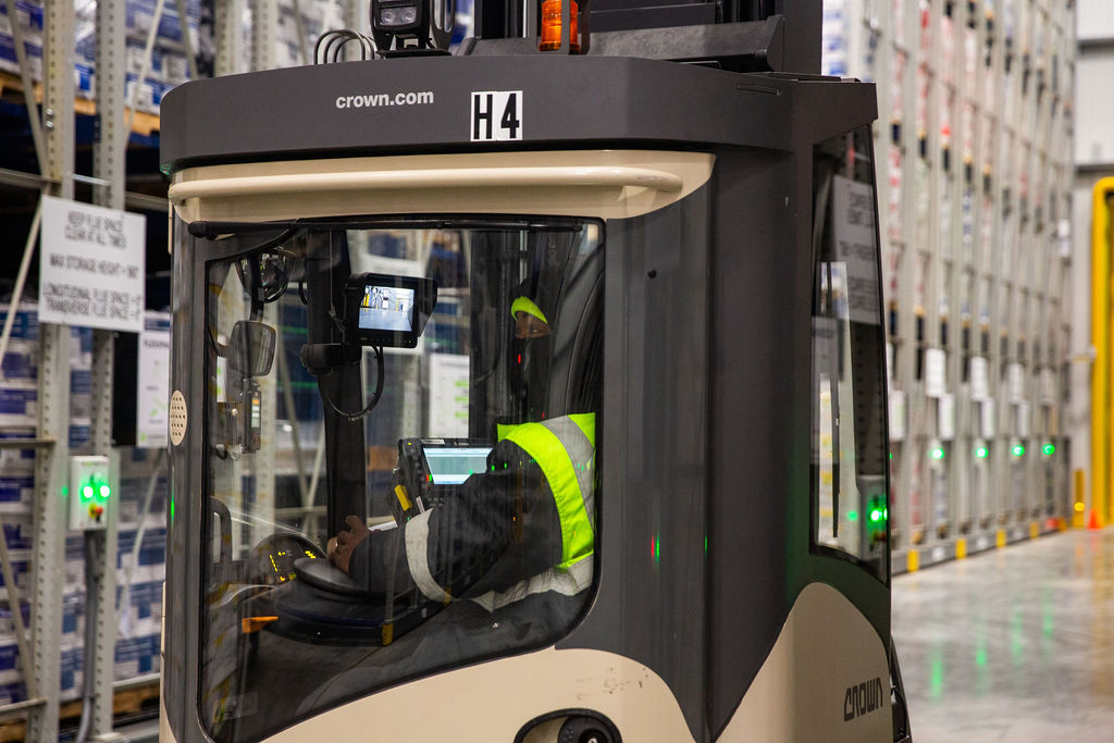 Forklift driver in a heated cab forklift at FlexCold-Jacksonville, FL.